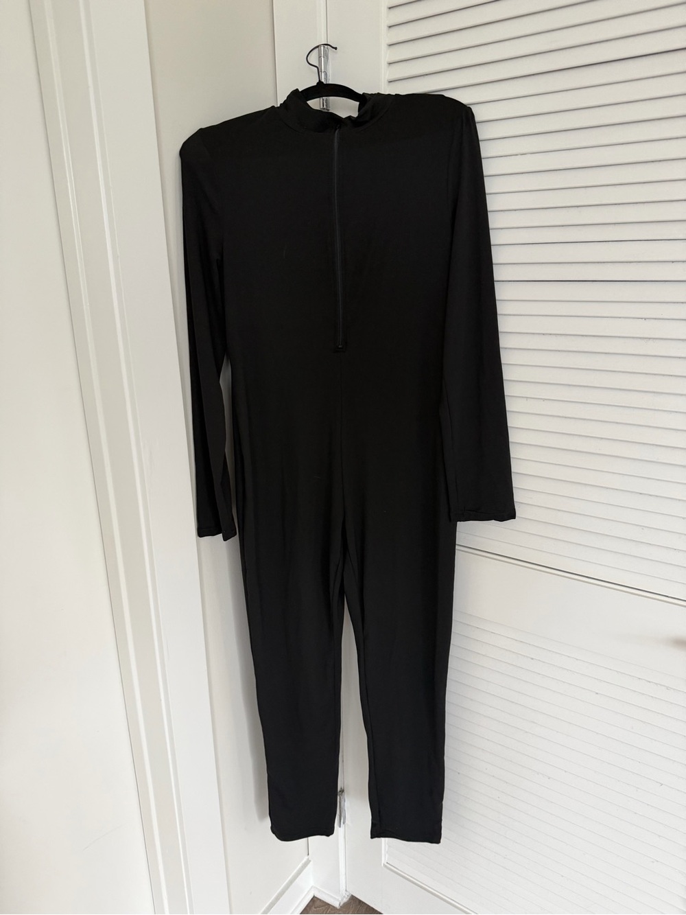 Minimal Black Long-Sleeve Zip Front Jumpsuit